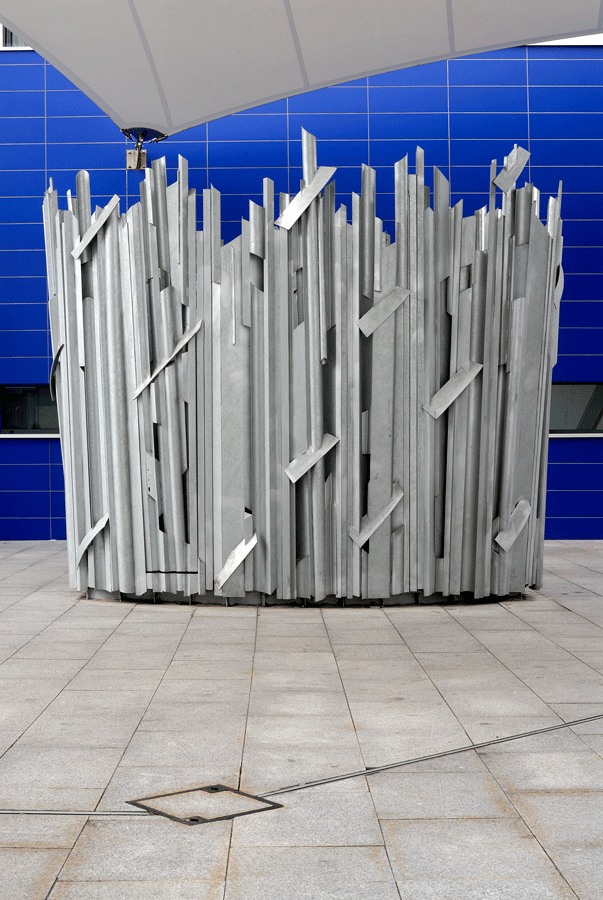 Vent surround sculpture in galvanized steel