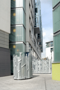 Vent surround and gate sculptures in steel